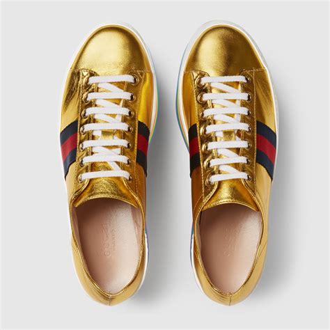 gucci gold sneakers.